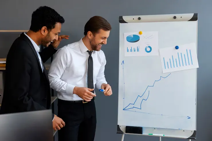 Business Person Looking Finance Graphs