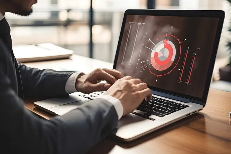 Cropped View Businessman Using Laptop With Pie